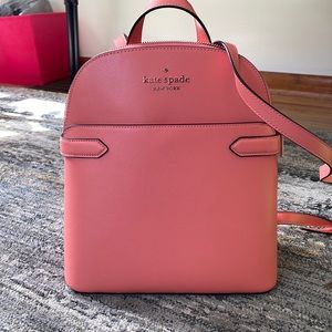 A salmon Kate Spade backpack purse. Never used.